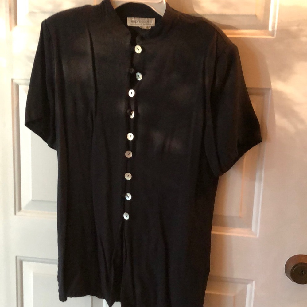 Black top with flat Pearl buttons